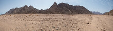 Panoramic View Of Barren Desert Landscape In Hot Climate