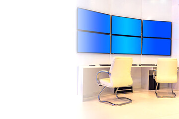 Poster - dispatch center. white space next to the control room. place for text. several large monitors in the