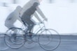 stripes image, movement of a cyclist with black jacket on white background