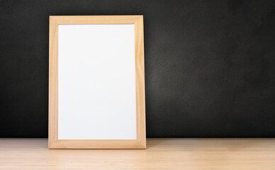 Wall Mural - empty wooden frame on dralk concrete wall background. home interior poster mock up with copy space