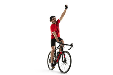 Wall Mural - Professional male bike rider on road bike isolated over white background.