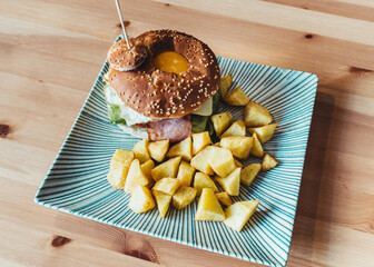 Poster - Hamburger with meat, eggs and fried potatoes