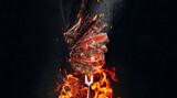 Fototapeta Tulipany - grilled beef steak on a dark background. expensive marbled beef of the highest grade fried to rare on the grill