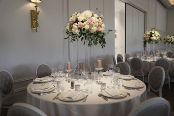 table set up for wedding with fresh flowers centerpiece