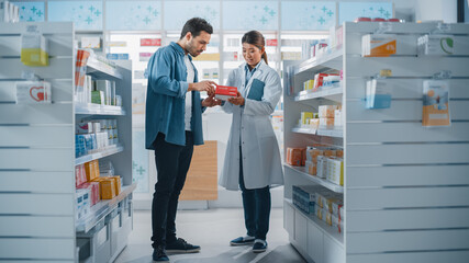 Wall Mural - Pharmacy Drugstore: Female Asian Pharmacist Helping Latin Male Customer with Recommendation, and Advice to Buy Medicine, Drugs, Vitamins. Modern Pharma Store Shelves with Health Care Products