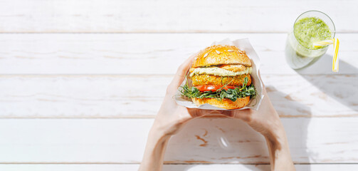 Wall Mural - vegan homemade burger with gluten-free bun and vegetable-based cutlet. detox burger