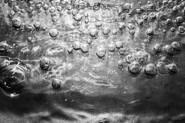 High Contrast Water and Bubbles on Metalic Surface