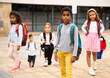 © JackF - Schoolchildren walking together on the street from school outdoors