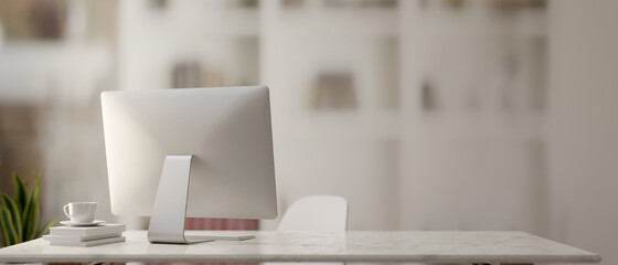 3D rendering, front view of office desk with computer, office supplies and copy space in blurred background