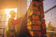 © Panumas - Bricklayer construction worker installing red brick masonry on exterior wall at outdoors construction site
