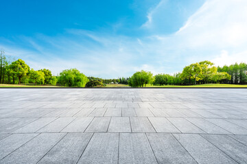 Poster - Wide square floor and green trees in natural park.