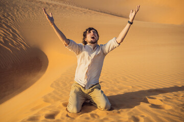 Exhausted man in the desert. Apathy, fatigue, exhaustion, mental disorders concept. Mental health