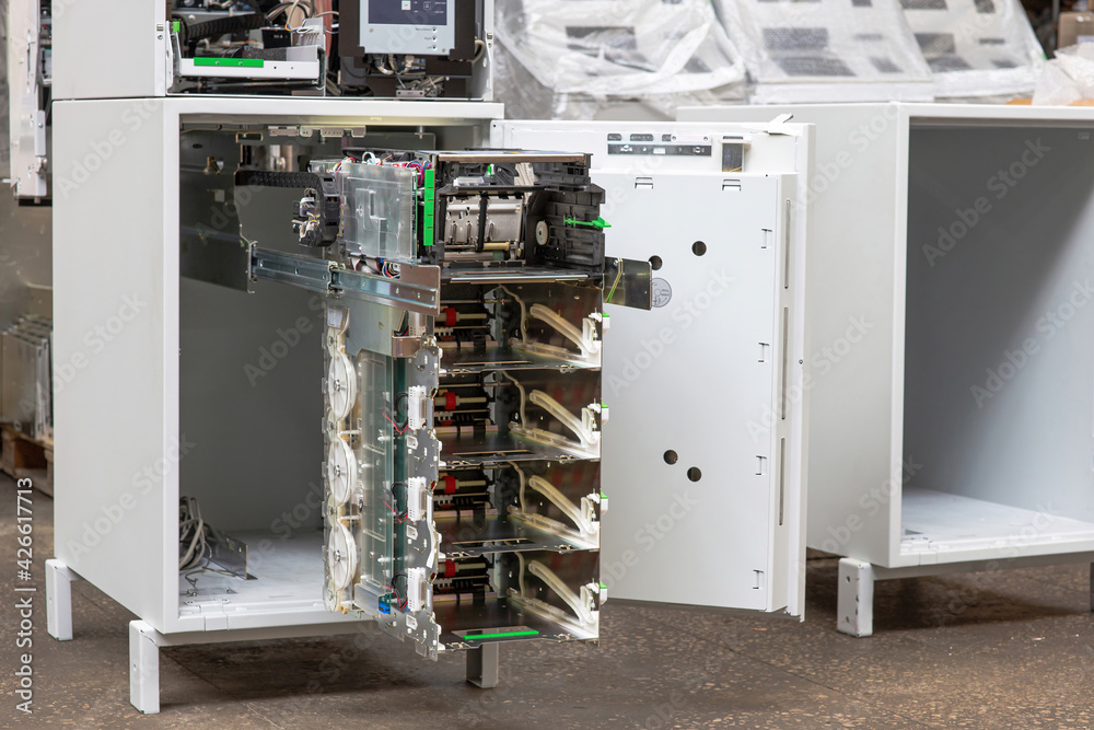Repair and maintenance of an ATM. Installing cassettes with cash in an ...