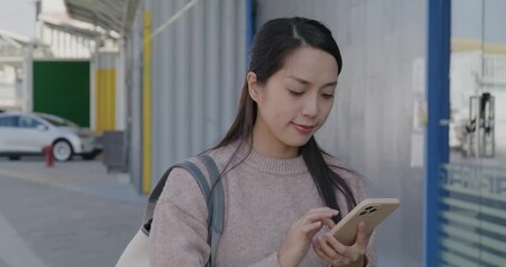 Canvas Print - Woman use mobile phone at outdoor