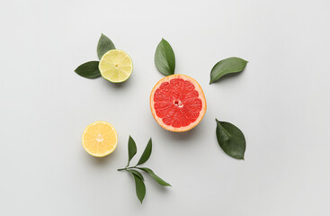 Fresh citrus fruits on white background