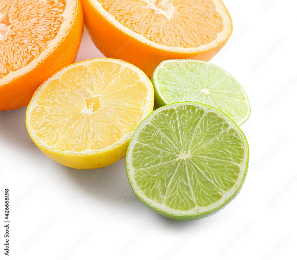 Fresh citrus fruits on white background