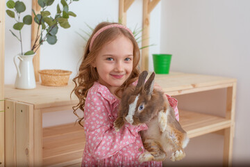 Wall Mural - happy little baby girl easter day holding little bunny