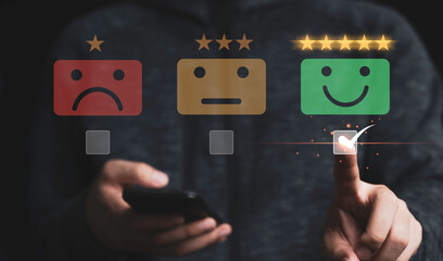 Poster - Businessman using mobile and touching to smiley face for customer survey product and service , Customer satisfaction and evaluation concept.