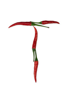 Font made of hot red chili pepper isolated on white - letter T