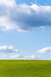 Green field and blue sky, concept of nature, outdoor relax.