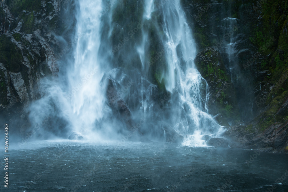 Stirling Falls plunging vertically into Milford Sound, New Zealand - obrazy, fototapety, plakaty 