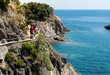 © Massimo Parisi - Monterosso,Liguria,Italy,June 2020. La via dell'amore panoramic path that connects the Cinque Terre: an amazing corner of coast with crystal clear waters and wild nature. Beautiful summer day,tourists
