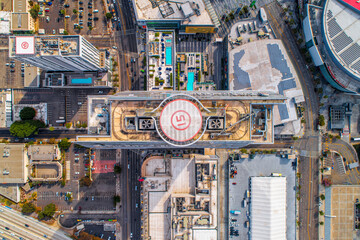 Aerial Shot of Downtown Los Angeles California. Beautiful stunning views of Downtown High Rise buildings and Rooftop Helipads. Beautiful Sunny day.