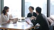 © taka - オフィスでミーティングをするアジア人のビジネスグループ