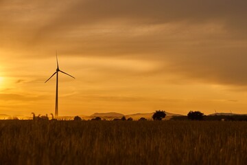 wind turbine at sunset