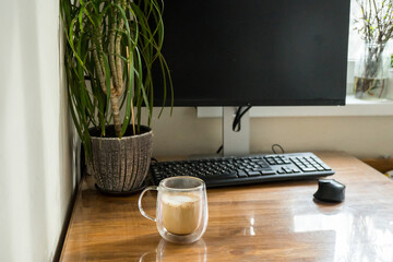 Wall Mural - Home office interior with laptop and cup of coffee