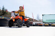 © shodography - young children are getting traffic education with fun. girl and boy are having fun driving battery cars.