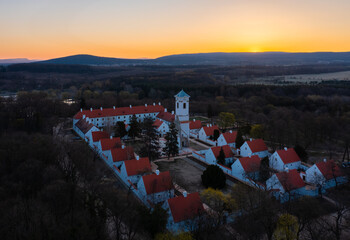 Wall Mural - Majk, Hungary - The famous baroque Camaldolese monastery on a spring morning from drone point of view. Majk (or Majkpuszta) is a small village in the municipality of Oroszlány near Tatabánya.