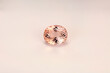 Natural, rare royal paech pink color, oval faceted, flawless, clean loose morganite gemstone. Potuguese classic custom cut, perfect shape and polish. White leather background.