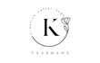 Creative initial letter K logo with lettering circle hand drawn flower element and leaf.