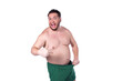 © vladorlov - Funny fat man and male health problems.