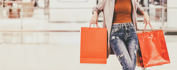 Asian shopping woman with paper bag in shopping mall Thailand