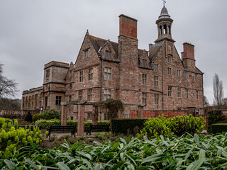 View of the abbey building surrounded by greenery.