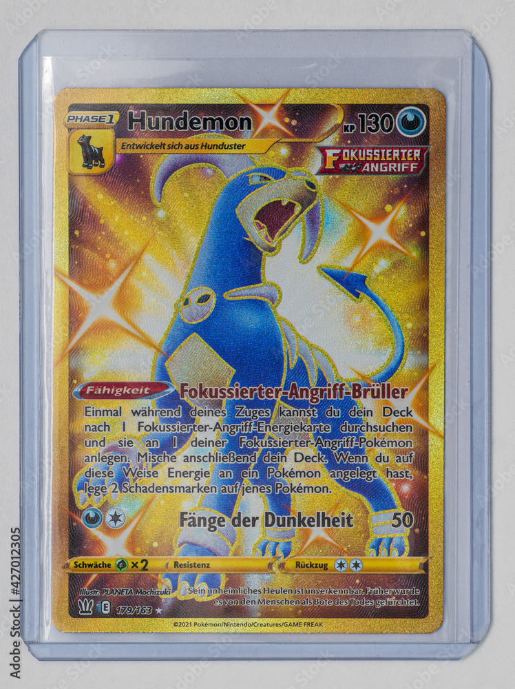 Hamburg Germany - 04112021: german Kampfstile pokemon secret rare gold card  of Houndoom or Hundemon in trading card sleeve on white background Stock  Photo | Adobe Stock