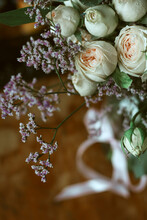 A Bouquet Of Spray White-orange Rosebuds And Purple Gypsophila Kermek-macro Shooting, Vertical Photography.