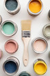 canvas print picture - Overhead view of a DIY paint brush with colorful sample paint pots