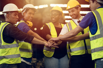 engineer teamwork concept,worker team join hands together in factory. people joining for cooperation