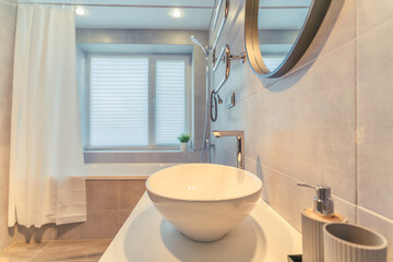 Bright modern bathroom interior in a luxury house.
