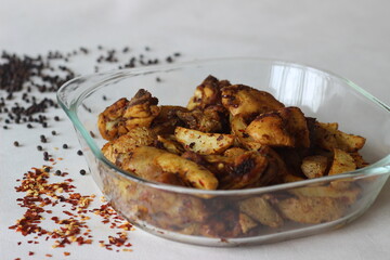 Wall Mural - Dry chicken fry and potato wedges, air fried