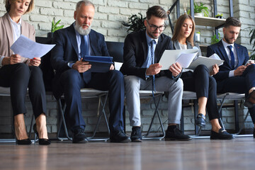 Wall Mural - Modern business people waiting for job interview.