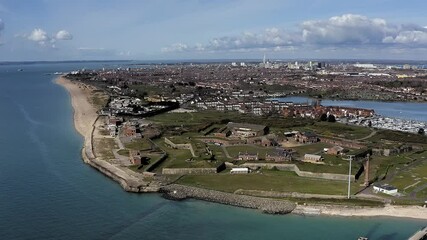 Wall Mural - Southsea Coastline Aerial Footage of Fort Cumberland with Southsea Marina in view and the City of Portsmouth in the background.
