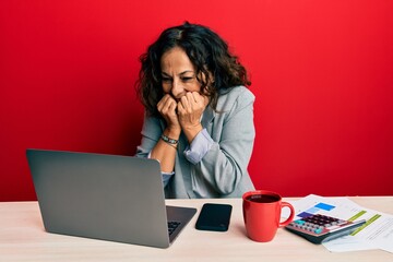 Sticker - Beautiful middle age woman working at the office drinking a cup of coffee laughing and embarrassed giggle covering mouth with hands, gossip and scandal concept