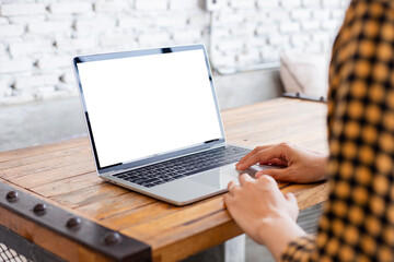 computer screen blank mockup.hand woman work using laptop with white background for advertising,contact business search information on desk at coffee shop.marketing and creative design