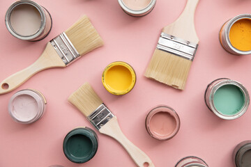 Wall Mural - Overhead view of a DIY paint brush with bright sample paint pots