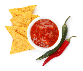 Bowl of tasty salsa sauce with peppers and nachos on white background