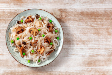 Wall Mural - Konjac pasta with vegetables, shot from above with copy space